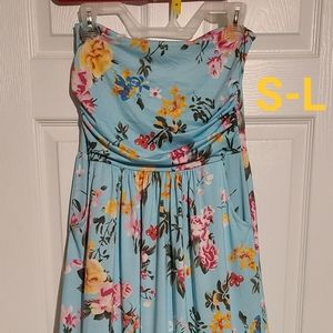 BOUTIQUE STRAPLESS DRESS WITH POCKETS.